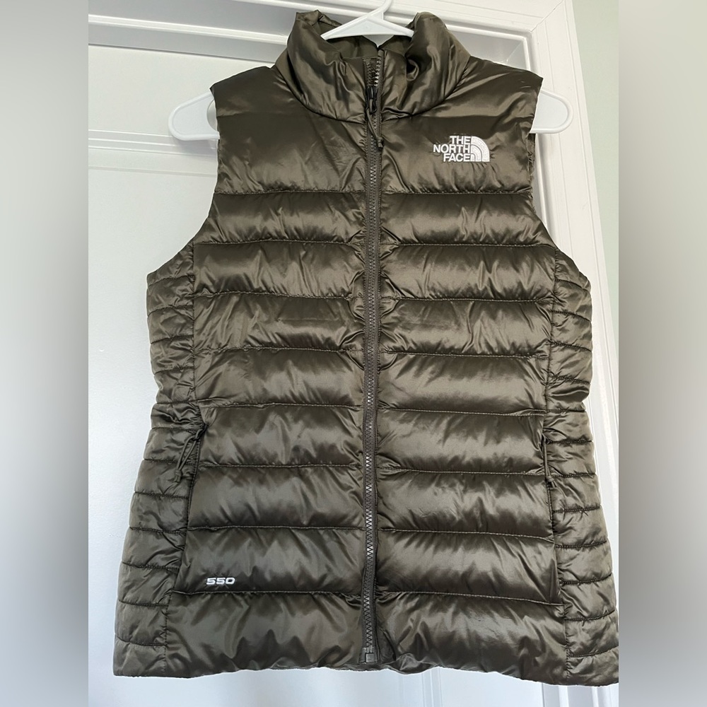 The North Face green shiny puffer vest. Super warm.